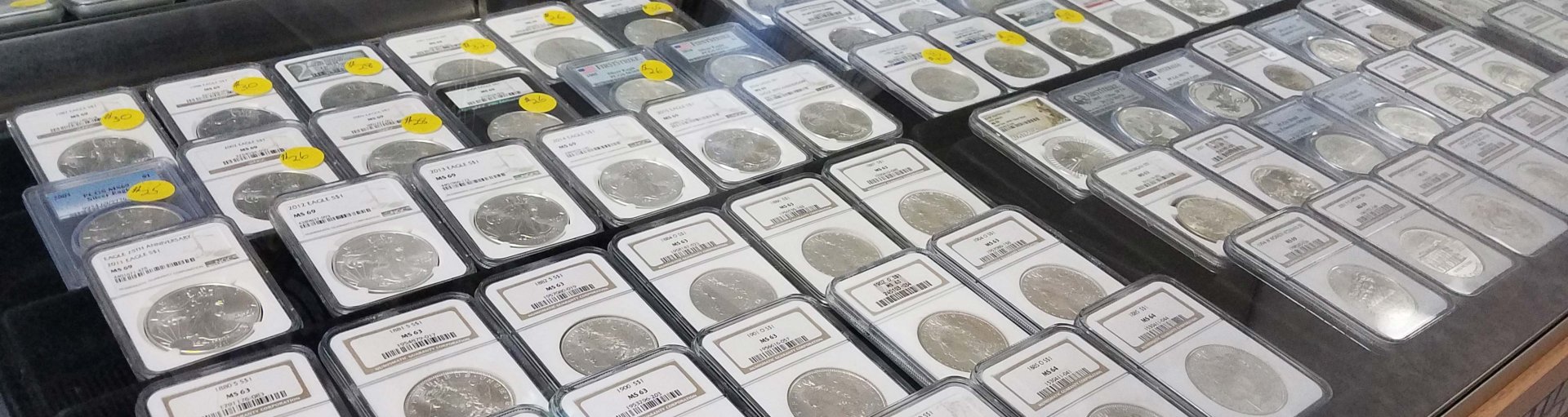 Stack of gold coins and bullion products